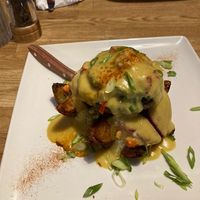 Red Pepper and Spinach-stuffed Portobello mushroom with smoked vegan Gouda  at Issac's Way in Fredericton