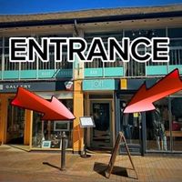 The entrance with stairs to go upstairs at The Loft in Sidmouth