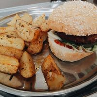 Veggie hamburger and fries at Govinda in Eger