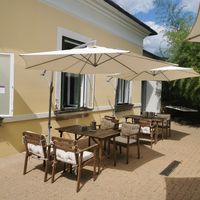Tables in the garden at Govinda in Eger