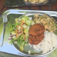 Tofu with peas, veggie meatloaf with salad and rice at Govinda in Eger