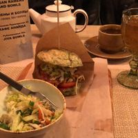 Seitan burger with salad and mors (sugar free berry drink) at Jiva Burgers in St Petersburg