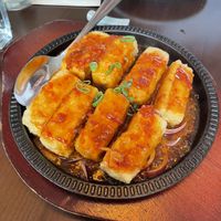 Sizzling tofu in house special sauce   at Tofu Vegan in Brighton