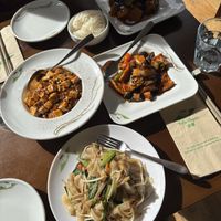 GF Ho Fun Noodles & Shiitake mushrooms & tofu in spicy sauce (front), Mapo tofu, dongbei style potato & aubergine (left & top right)  at Tofu Vegan in Brighton