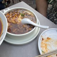 Home made silken tofu in savory sauce   at Tofu Vegan in Brighton