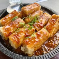Sizzling tofu in house special sauce   at Tofu Vegan in Brighton