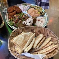 Dips, falafel and pita bread (part of The Persepolis Full Feast)  at Persepolis - Snackistan in South East London