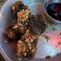 Chive cakes (half eaten) at Esan Thai SE Division in Portland