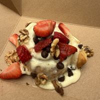 Basic roll with strawberries, chocolate chips and walnuts   at Cinnaholic - Berkeley in Berkeley