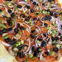 The Vegan Sauce is AMAZing and the crust is the best I have ever had on any pizza 😋  at Mezza Luna Pizzeria in Eugene