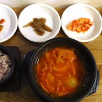 Army stew set (budae jjigae), labelled as Kimchi soup with sausage. This is not found on the sheet of menu with pictures. I saw this on the wall and ordered it. It was really delicious. Too bad the soup was only half of the stone bowl. at Babione - 바비오네 in Seoul