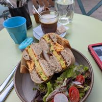 Egg and cheese bagel as vegan option at Cafe Xoho in Tel Aviv