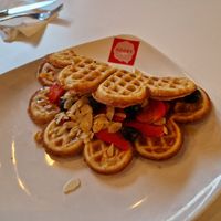 Vegan waffle with blueberry and strawberry filling and maple syrup at Gooey Waffle in Enfield