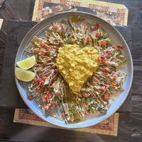 Chilaquiles con tofu egg  the chips and salsa where great.  The tofu was bland.    at Samsara in Antigua
