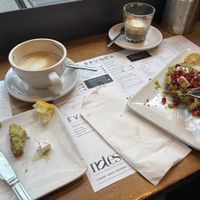 Avo on toast with beat root hummus, vegan feta and pomegranate   at Notes in Canary Wharf