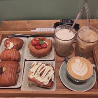 Cinnamon roll, salty pastry with pesto, mozzarella and tomatos, pain swiss and fiocco at Sementis Bakery in Pietrasanta