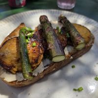 Asparagus, tempeh bacon and white bean pate on toast at Charlie's Cafe & Wine Bar in Gloucestershire