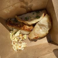 Half of the veggie potstickers (late picture.) Forgot to take a picture of the bowl too! All were very delicious ! at The Kitchen in Orcas Island