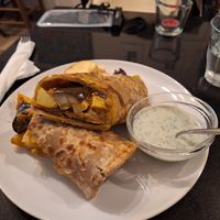 Wrap mit Aubergine und Kartoffel dazu Minz Yogurt Dip at Nirvana Cafe in Luxembourg City