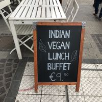 Outside sign on street corner  at Nirvana Cafe in Luxembourg City