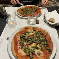 Pizza with mushrooms, lentil mozzarella and vegan pesto   at La Colubrina in Milan