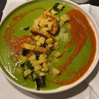 Mezzelune di tempeh rosolato con funghi shiitake saltati e ragù di pomodorini confit e piselli  at La Colubrina in Milan