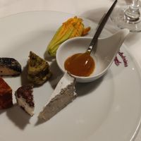 Nut cheese selection, the flower has vegan feta inside at La Colubrina in Milan