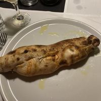 Baguette (calzone - folded pizza with tofu and spinach)   at La Colubrina in Milan