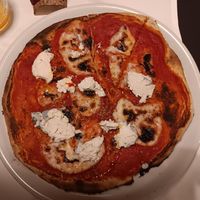 Pizza with homemade 'mozzarella' and blue cheese at La Colubrina in Milan