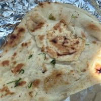 vegan garlic naan. request for vegan option. at Hurry For Curry in Louisville