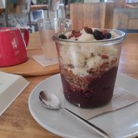 Açaí Bowl 🫐 with Homemade Granola, Bananas 🍌 rolled in Coconut Flakes 🥥 and Goji Berries at Wild Beets in Ibiza