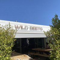 Large inside and outdoor seating on cool long tables  at Wild Beets in Ibiza