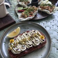 tomato ricotta sandwich und pad krapao boats  at The Quarter - Creative Space Café in Surat Thani