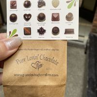 Our bag of chocolates and the card that identifies them  at Pure Lovin' Chocolate in Victoria