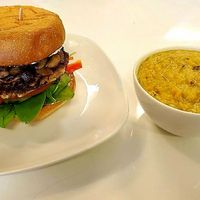 Mushroom chana burger with bowl of kitchari at Baagan in San Ramon