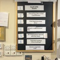 Translated Lunch set menu.. I use  Papago.  There is no milk or crab.. just a bad translation!Ask which ones contain egg..   you get to pick three!  at Liza Veggies 麗姐廚房 - Wan Chai in Hong Kong Island