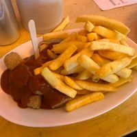 Sausage and fries  at Bergwolf in Munich