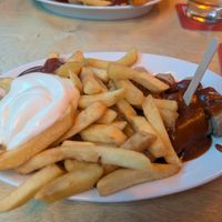 Vegan Currywurst with ketchup and mayo at Bergwolf in Munich