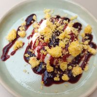 Panna cotta con crumble e marmellata di ciliegia at KORA - Bistrot Vegetale in Cuneo