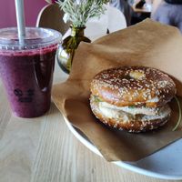 Bagel with tofu, hummus, veggies. Berry smoothie at ROOTS Herttoniemi in Helsinki