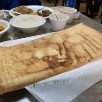 Plain Dosa. Crispy, hot from the grill. Tastes like cheezy bread to me. Yum! at Taj Chaat House in Irving