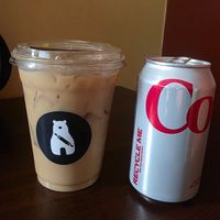 Iced oatmilk latte. Can for scale. at Forgotten Bakery in Sacramento