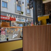 Inside view towards pedestrian area at Fox William Coffee Shop & Cafe in Fort William