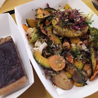 Vegan plate 🥬 and vegan chocolate cake 🍰 at Genuino in Trieste