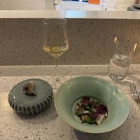 Salad and dumpling  at Ten Restaurant in Toronto