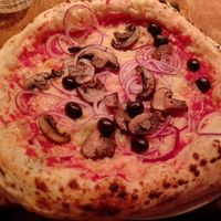 Personalised pizza - red sauce, vegan cheese, mushrooms, red onion and olives! at Crust Bros Pizza Covent Garden in London