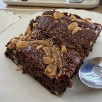 A BROWNIE with peanut butter swirls and gold sprinkles!! DEEEELISH  at Graine in Clermont-ferrand