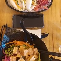 Salt and pepper tofu ramen and bao buns. Miso broth came in the little jug on the side! at Selar in Pwllheli