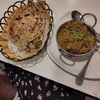 Brinzal bharta (mushed eggplant dish) and alu piaz paratha (wheat bread with onion and potato), both good at Saravana 娑羅婆納 in Kowloon