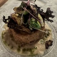 FARRO CAKE
seared farro cake served with a sunchoke puree with maitake mushrooms, seared brussel sprouts, and a herb oil
$29
vegetarian, vegan ( < —from website)  at Bridges & Bourbon in Pittsburgh